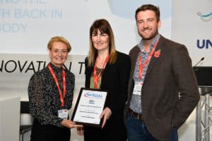 Creativeworld with Darwenside Dental practice, accepting the Highly Commended Award for their work in the Smile4Life initiative
