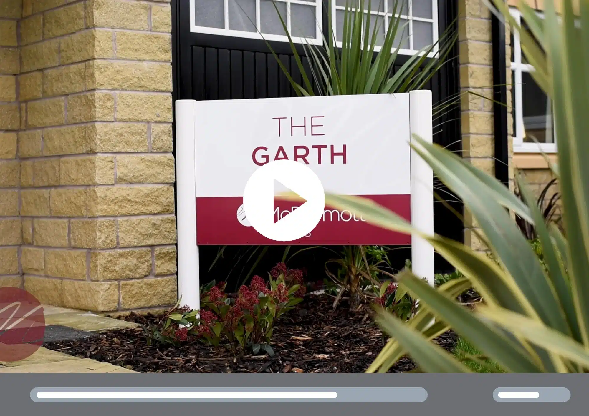The Garth care home sign outside brick building