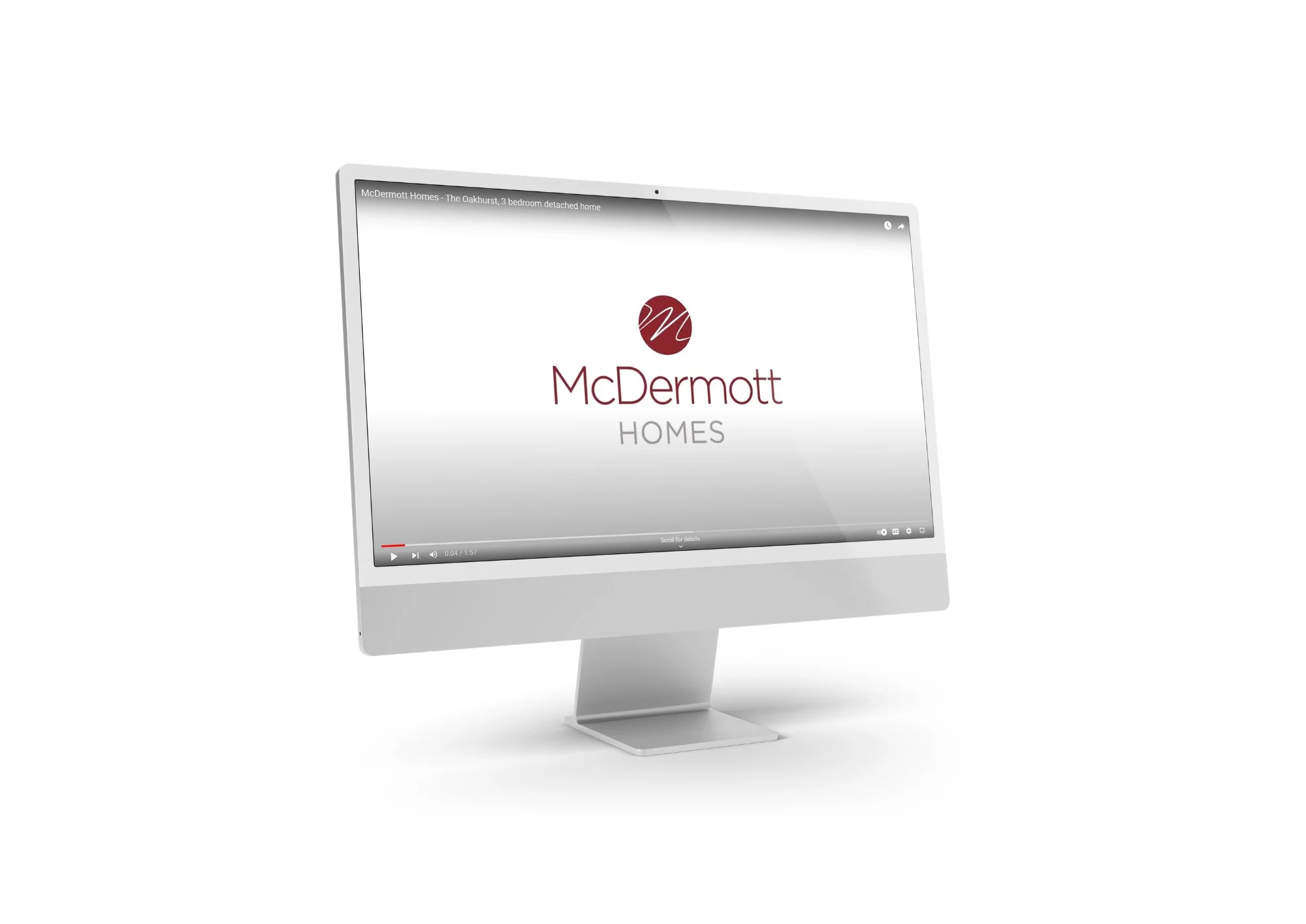 Computer monitor displaying McDermott Homes promotional video