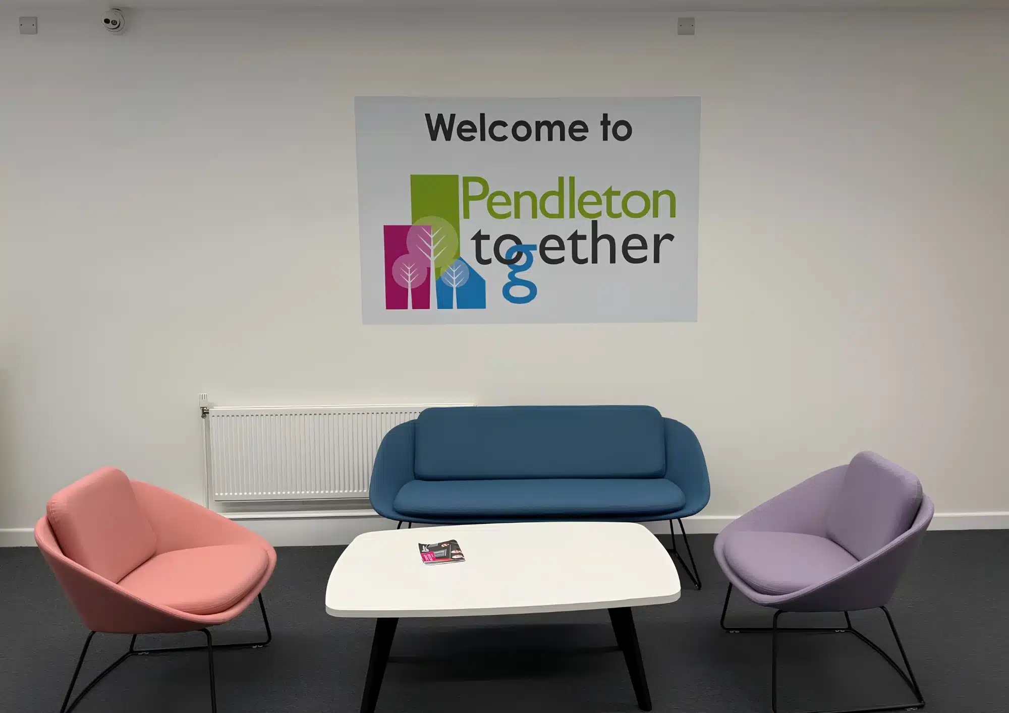 Colourful Pendleton Together seating area with welcome sign